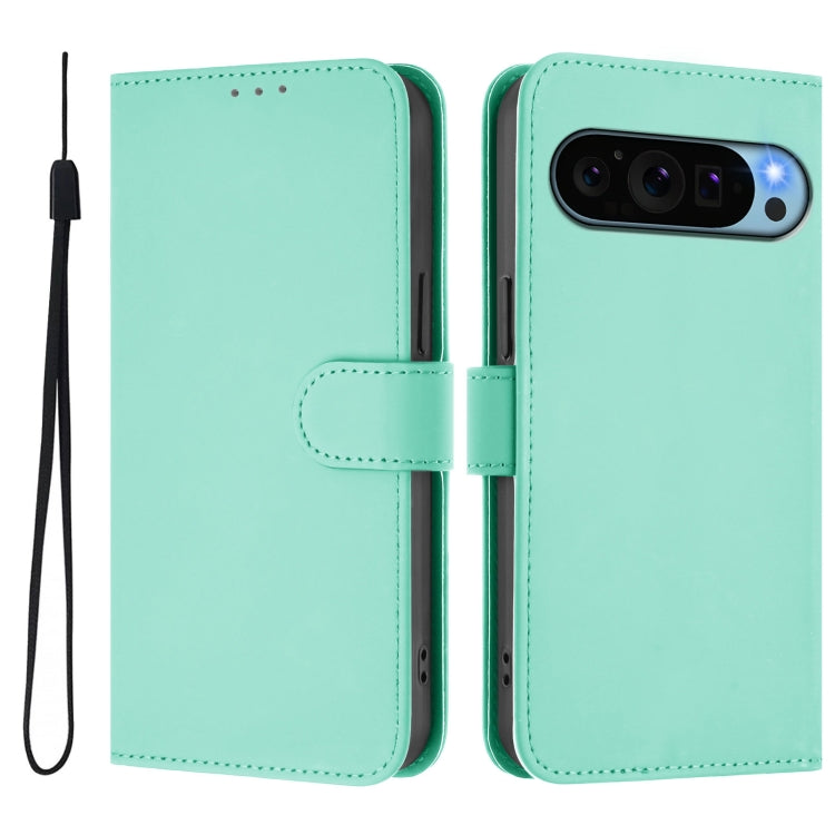 For Google Pixel 9 / Pixel 9 Pro Skin Feel Solid Color Leather Phone Case with Lanyard