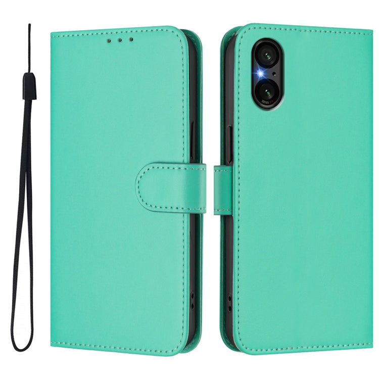 For Sony Xperia 5 V Skin Feel Solid Color Leather Phone Case with Lanyard