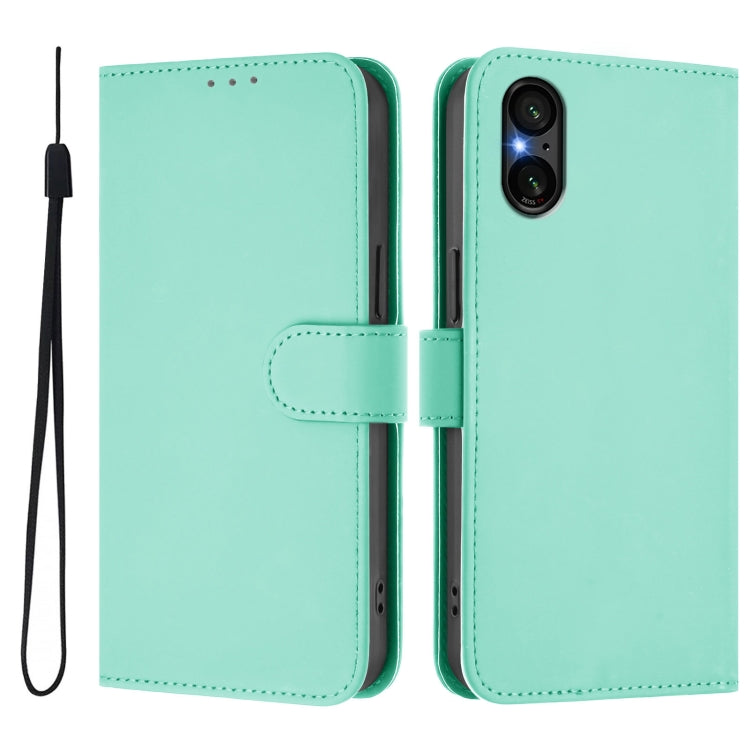 For Sony Xperia 5 V Skin Feel Solid Color Leather Phone Case with Lanyard
