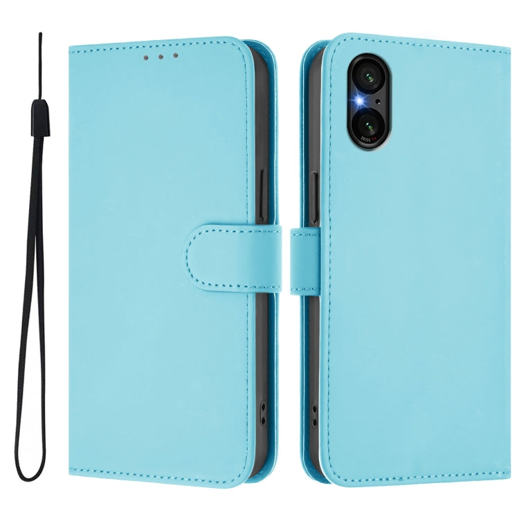 For Sony Xperia 5 V Skin Feel Solid Color Leather Phone Case with Lanyard