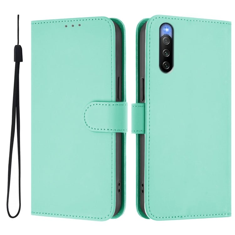For Sony Xperia 10 V 2023 Skin Feel Solid Color Leather Phone Case with Lanyard