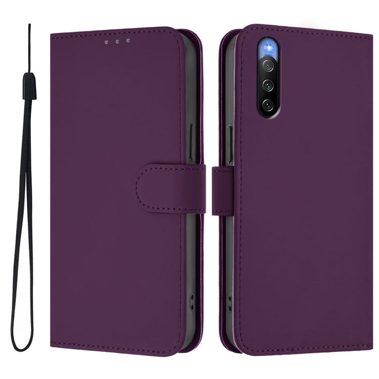 For Sony Xperia 10 V 2023 Skin Feel Solid Color Leather Phone Case with Lanyard