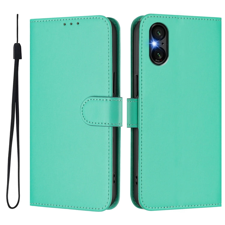 For Sony Xperia 5 VI Skin Feel Solid Color Leather Phone Case with Lanyard