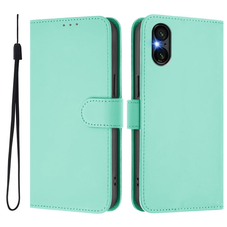 For Sony Xperia 5 VI Skin Feel Solid Color Leather Phone Case with Lanyard