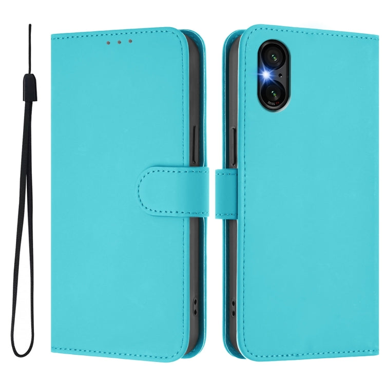 For Sony Xperia 5 VI Skin Feel Solid Color Leather Phone Case with Lanyard