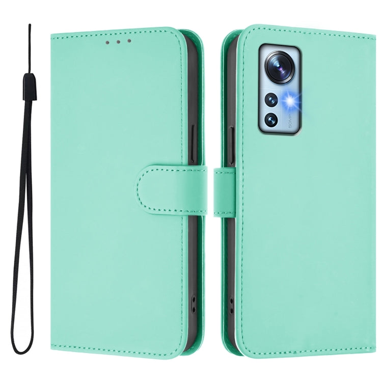 For Xiaomi 12 5G / 12S 5G / 12X 5G Skin Feel Solid Color Leather Phone Case with Lanyard