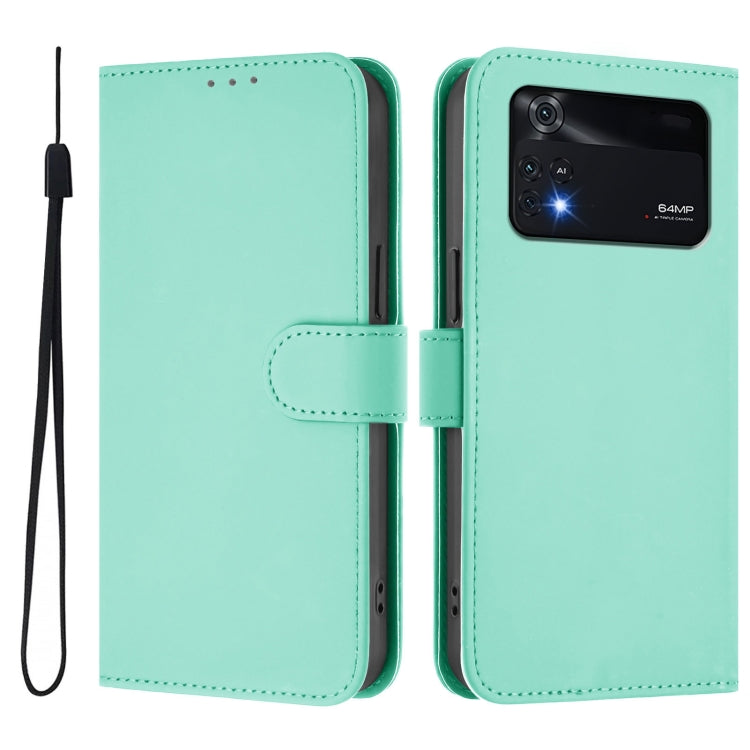 For Xiaomi Poco M4 Pro 4G Skin Feel Solid Color Leather Phone Case with Lanyard
