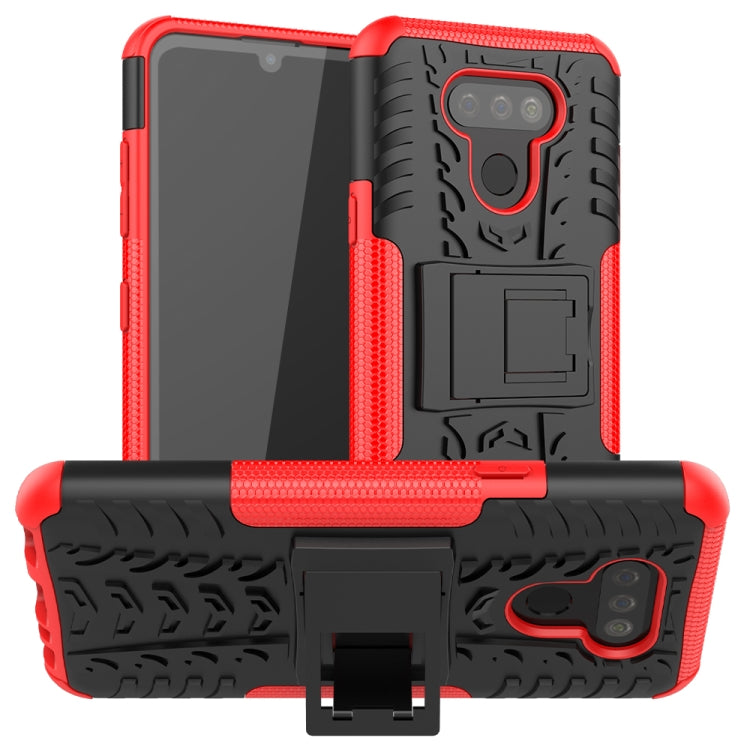 For LG Harmony 4 Tire Texture Shockproof TPU + PC Protective Case with Holder