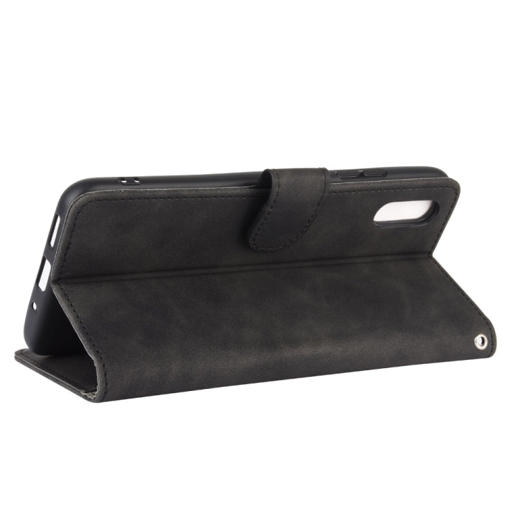 For Xiaomi Redmi 9A Solid Color Skin Feel Magnetic Buckle Horizontal Flip Calf Texture PU Leather Case with Holder & Card Slots & Wallet