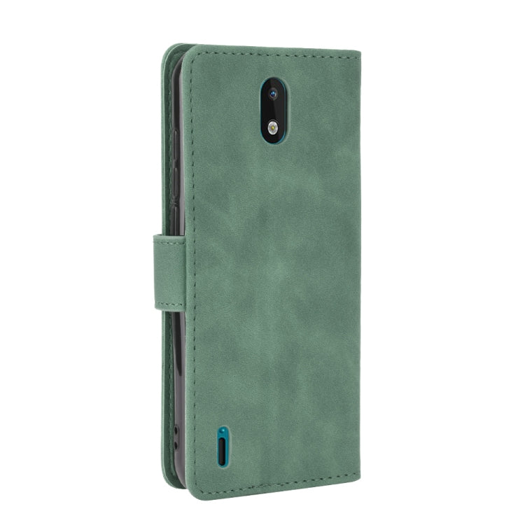 For Nokia 1.3 Solid Color Skin Feel Magnetic Buckle Horizontal Flip Calf Texture PU Leather Case with Holder & Card Slots & Wallet