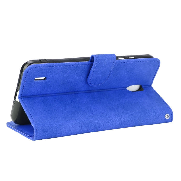 For Nokia C2 Solid Color Skin Feel Magnetic Buckle Horizontal Flip Calf Texture PU Leather Case with Holder & Card Slots & Wallet