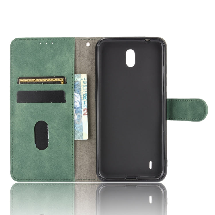 For Nokia C2 Solid Color Skin Feel Magnetic Buckle Horizontal Flip Calf Texture PU Leather Case with Holder & Card Slots & Wallet
