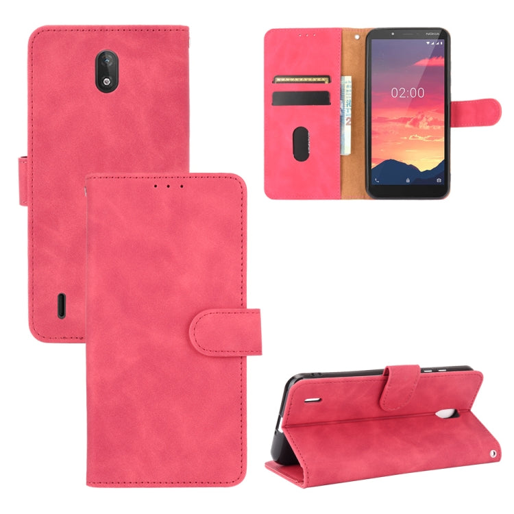 For Nokia C2 Solid Color Skin Feel Magnetic Buckle Horizontal Flip Calf Texture PU Leather Case with Holder & Card Slots & Wallet