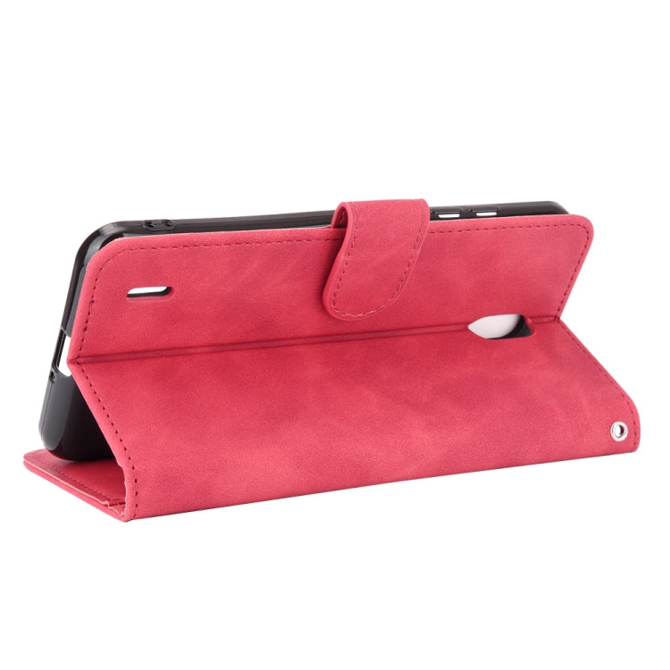 For Nokia C2 Solid Color Skin Feel Magnetic Buckle Horizontal Flip Calf Texture PU Leather Case with Holder & Card Slots & Wallet