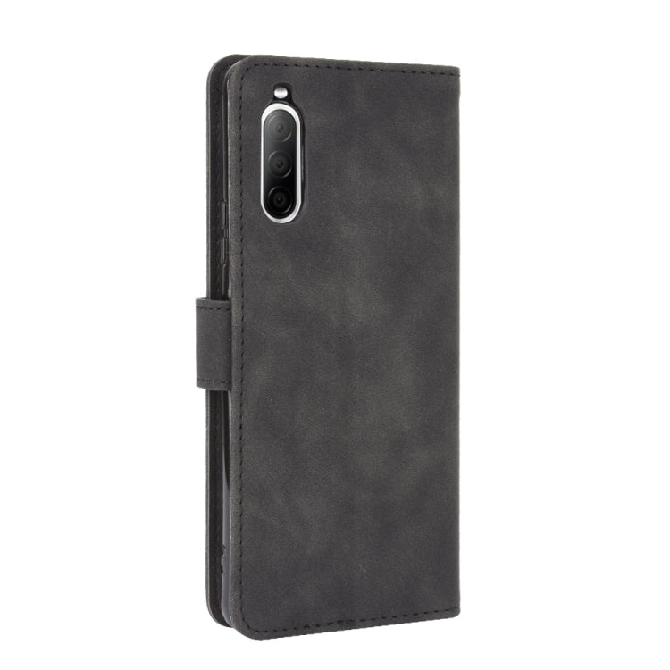 For Sony Xperia 10 II Solid Color Skin Feel Magnetic Buckle Horizontal Flip Calf Texture PU Leather Case with Holder & Card Slots & Wallet