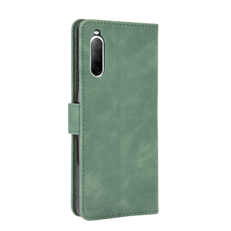 For Sony Xperia 10 II Solid Color Skin Feel Magnetic Buckle Horizontal Flip Calf Texture PU Leather Case with Holder & Card Slots & Wallet