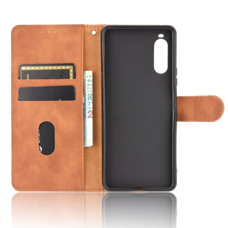 For Sony Xperia 10 II Solid Color Skin Feel Magnetic Buckle Horizontal Flip Calf Texture PU Leather Case with Holder & Card Slots & Wallet