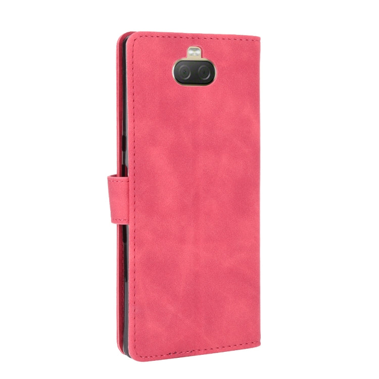For Sony Xperia 10 Solid Color Skin Feel Magnetic Buckle Horizontal Flip Calf Texture PU Leather Case with Holder & Card Slots & Wallet