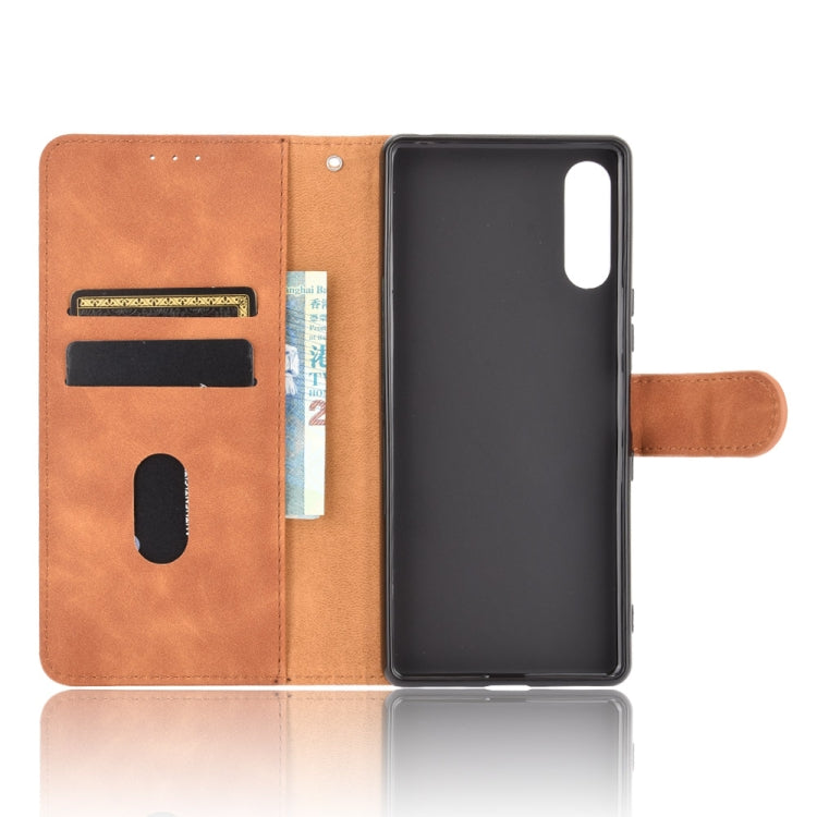 For Sony Xperia L4 Solid Color Skin Feel Magnetic Buckle Horizontal Flip Calf Texture PU Leather Case with Holder & Card Slots & Wallet