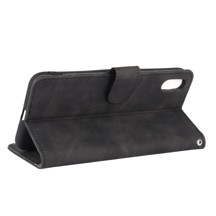 For iPhone XR Solid Color Skin Feel Magnetic Buckle Horizontal Flip Calf Texture PU Leather Case with Holder & Card Slots & Wallet
