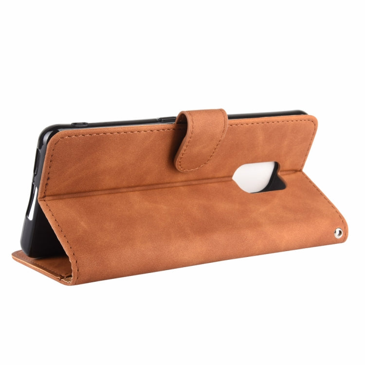 For Fujitsu Arrows 5G (F-51A) Solid Color Skin Feel Magnetic Buckle Horizontal Flip Calf Texture PU Leather Case with Holder & Card Slots & Wallet