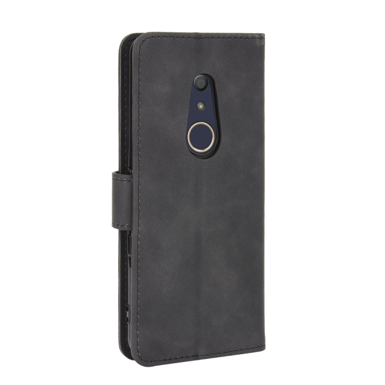 For Fujitsu Arrows Be4 (F-41A) Solid Color Skin Feel Magnetic Buckle Horizontal Flip Calf Texture PU Leather Case with Holder & Card Slots & Wallet