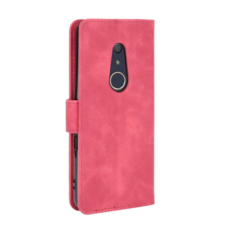 For Fujitsu Arrows Be4 (F-41A) Solid Color Skin Feel Magnetic Buckle Horizontal Flip Calf Texture PU Leather Case with Holder & Card Slots & Wallet