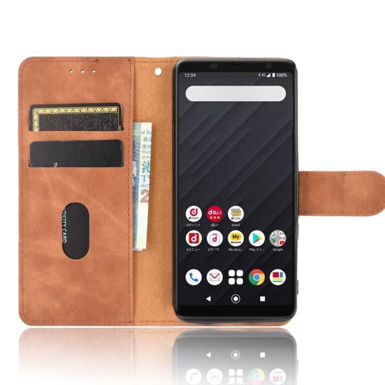 For Fujitsu Arrows Be4 (F-41A) Solid Color Skin Feel Magnetic Buckle Horizontal Flip Calf Texture PU Leather Case with Holder & Card Slots & Wallet