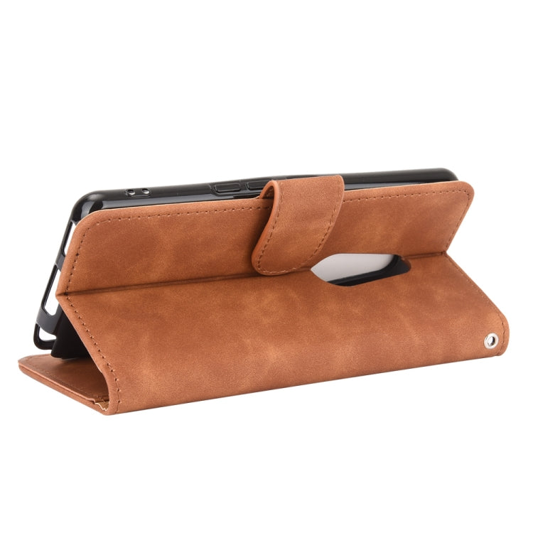 For Fujitsu Arrows Be4 (F-41A) Solid Color Skin Feel Magnetic Buckle Horizontal Flip Calf Texture PU Leather Case with Holder & Card Slots & Wallet