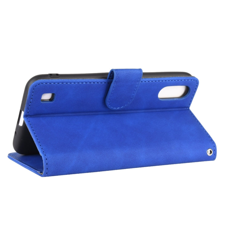 For Samsung Galaxy A01 (Global Version) Solid Color Skin Feel Magnetic Buckle Horizontal Flip Calf Texture PU Leather Case with Holder & Card Slots & Wallet