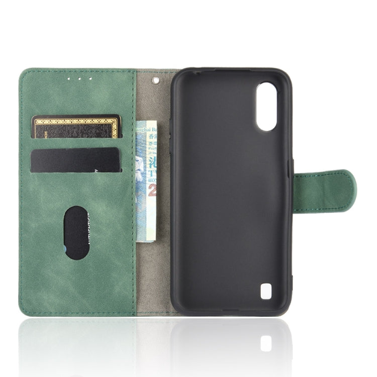 For Samsung Galaxy A01 (Global Version) Solid Color Skin Feel Magnetic Buckle Horizontal Flip Calf Texture PU Leather Case with Holder & Card Slots & Wallet