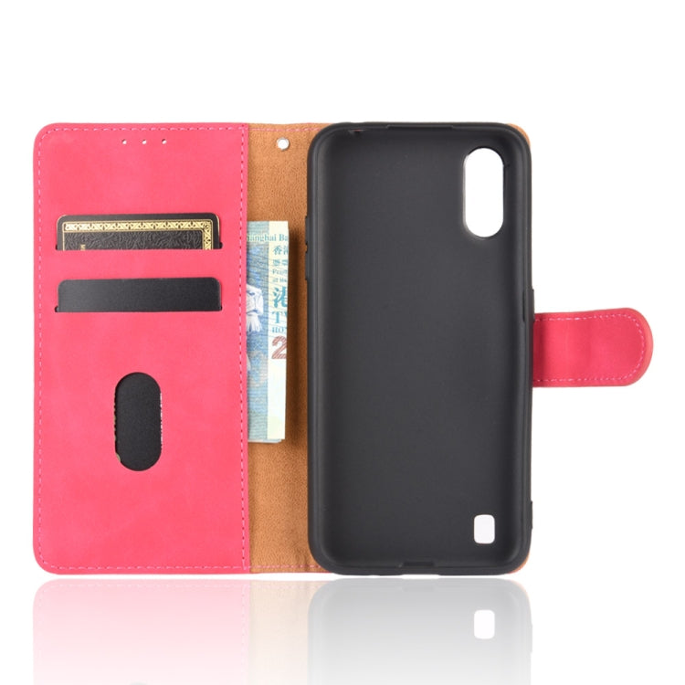 For Samsung Galaxy A01 (Global Version) Solid Color Skin Feel Magnetic Buckle Horizontal Flip Calf Texture PU Leather Case with Holder & Card Slots & Wallet