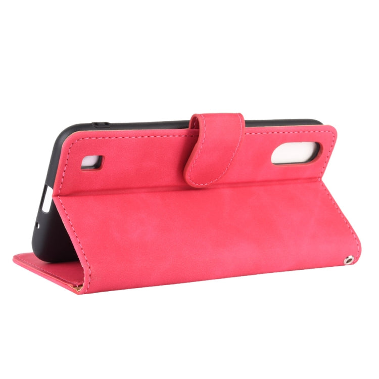 For Samsung Galaxy A01 (Global Version) Solid Color Skin Feel Magnetic Buckle Horizontal Flip Calf Texture PU Leather Case with Holder & Card Slots & Wallet
