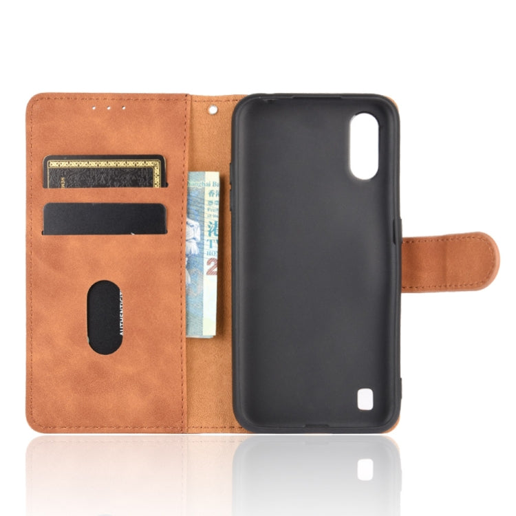 For Samsung Galaxy A01 (Global Version) Solid Color Skin Feel Magnetic Buckle Horizontal Flip Calf Texture PU Leather Case with Holder & Card Slots & Wallet