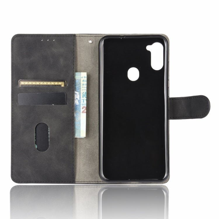 For Samsung Galaxy A11 (Eurasian Version) Solid Color Skin Feel Magnetic Buckle Horizontal Flip Calf Texture PU Leather Case with Holder & Card Slots & Wallet