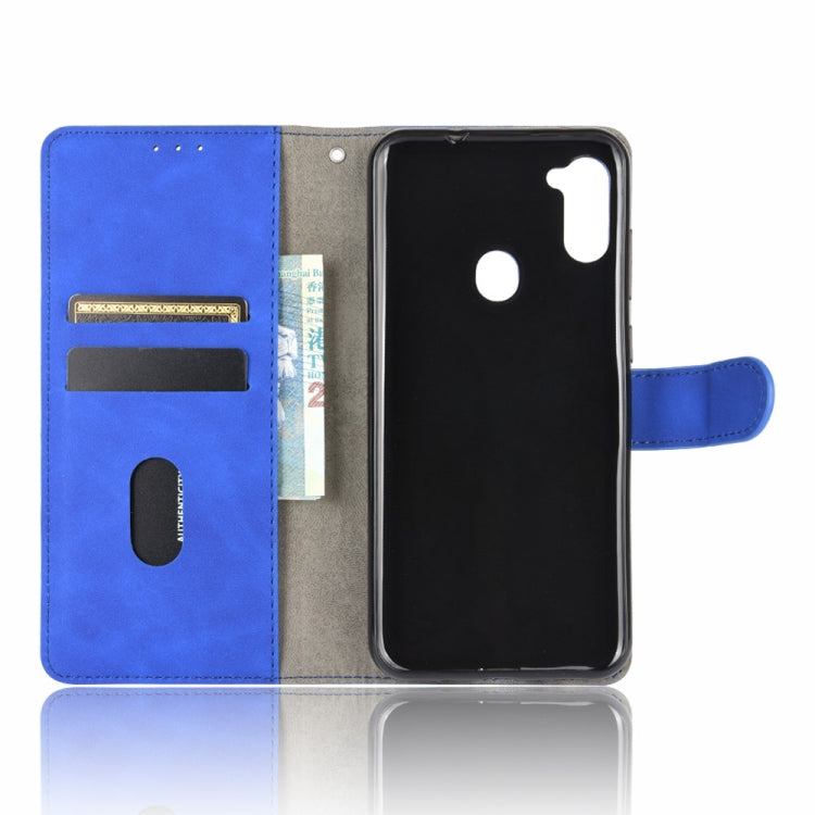 For Samsung Galaxy A11 (Eurasian Version) Solid Color Skin Feel Magnetic Buckle Horizontal Flip Calf Texture PU Leather Case with Holder & Card Slots & Wallet