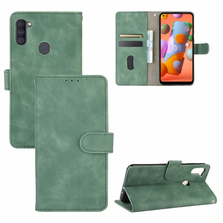 For Samsung Galaxy A11 (Eurasian Version) Solid Color Skin Feel Magnetic Buckle Horizontal Flip Calf Texture PU Leather Case with Holder & Card Slots & Wallet