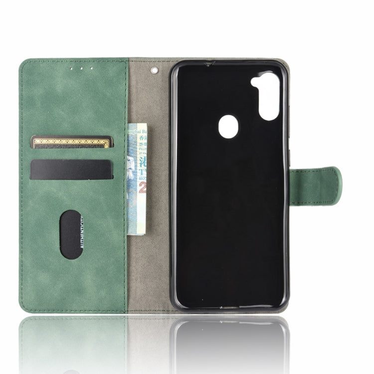 For Samsung Galaxy A11 (Eurasian Version) Solid Color Skin Feel Magnetic Buckle Horizontal Flip Calf Texture PU Leather Case with Holder & Card Slots & Wallet