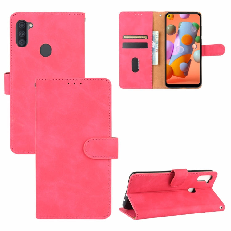 For Samsung Galaxy A11 (Eurasian Version) Solid Color Skin Feel Magnetic Buckle Horizontal Flip Calf Texture PU Leather Case with Holder & Card Slots & Wallet