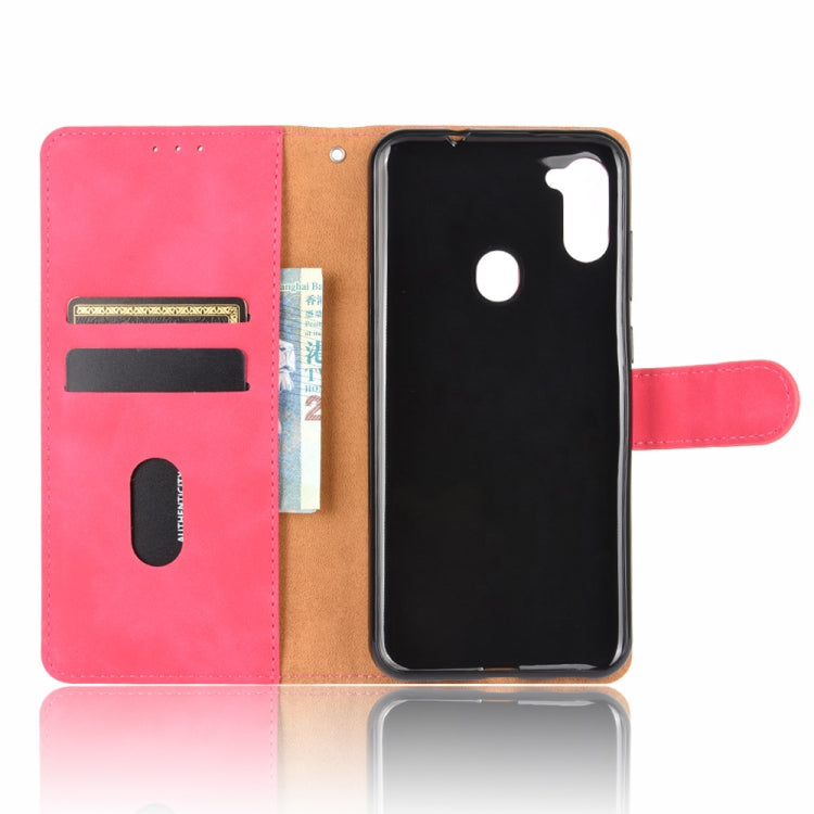 For Samsung Galaxy A11 (Eurasian Version) Solid Color Skin Feel Magnetic Buckle Horizontal Flip Calf Texture PU Leather Case with Holder & Card Slots & Wallet