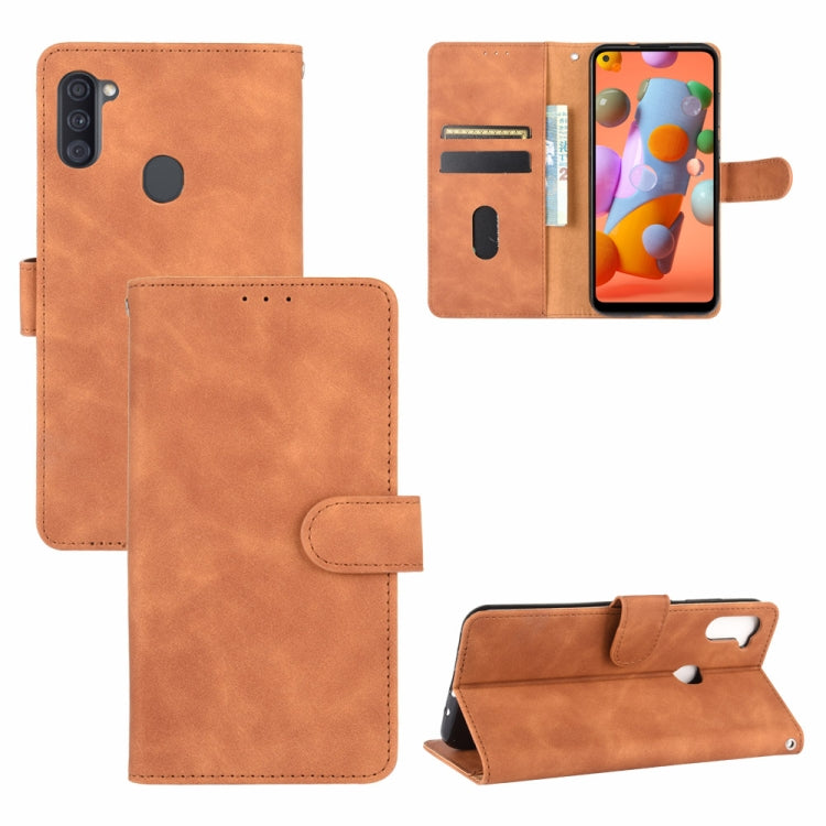 For Samsung Galaxy A11 (Eurasian Version) Solid Color Skin Feel Magnetic Buckle Horizontal Flip Calf Texture PU Leather Case with Holder & Card Slots & Wallet