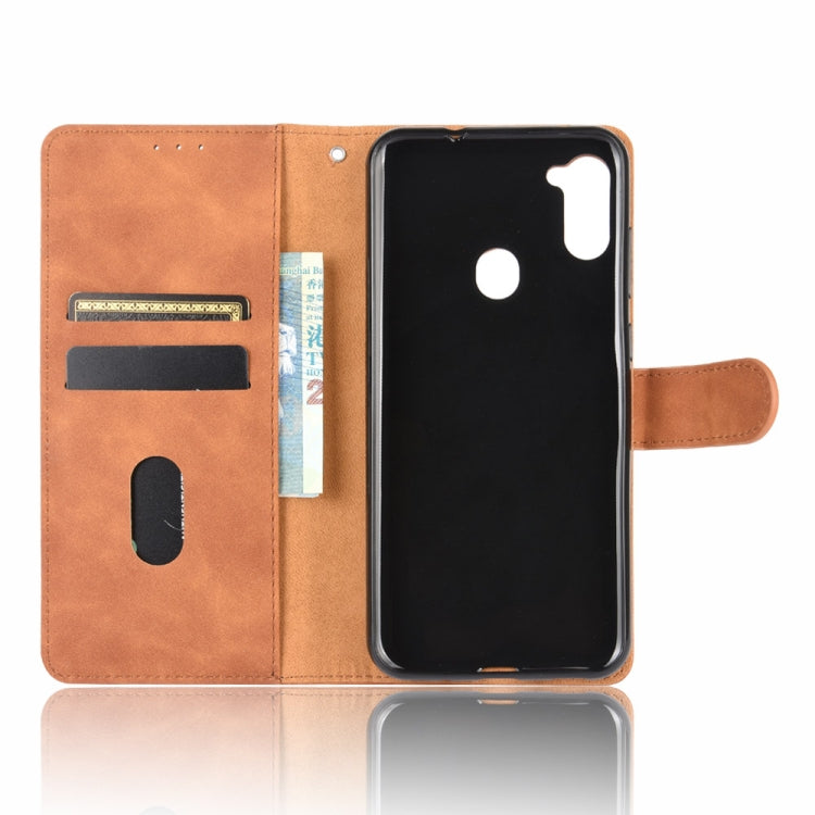 For Samsung Galaxy A11 (Eurasian Version) Solid Color Skin Feel Magnetic Buckle Horizontal Flip Calf Texture PU Leather Case with Holder & Card Slots & Wallet