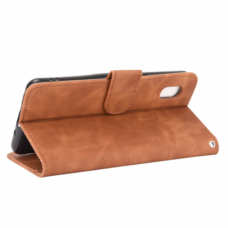 For Samsung Galaxy A20 (Japanese Version) Solid Color Skin Feel Magnetic Buckle Horizontal Flip Calf Texture PU Leather Case with Holder & Card Slots & Wallet