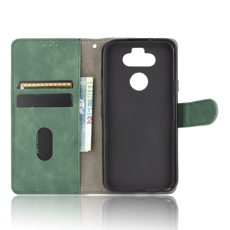 For LG K31 / Aristo 5 Solid Color Skin Feel Magnetic Buckle Horizontal Flip Calf Texture PU Leather Case with Holder & Card Slots & Wallet