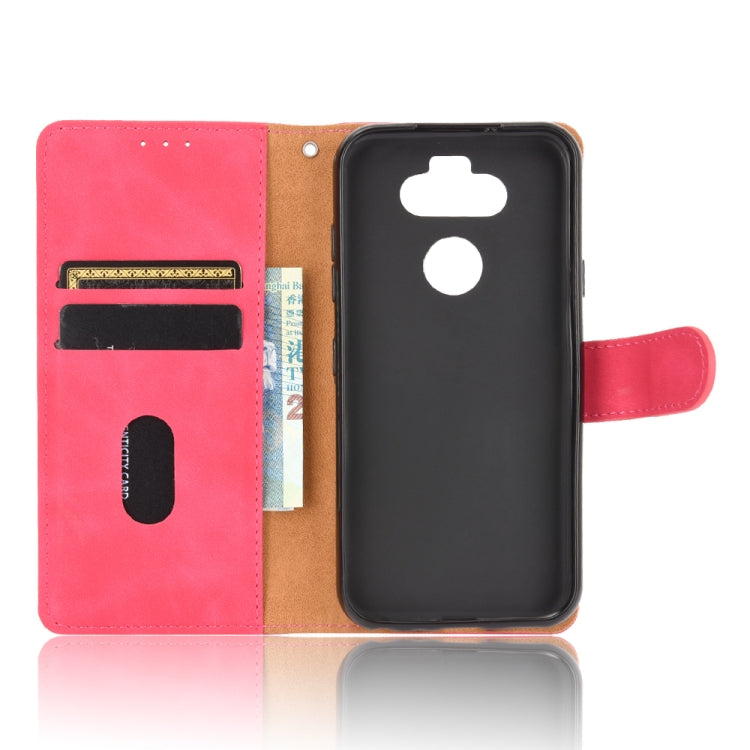 For LG K31 / Aristo 5 Solid Color Skin Feel Magnetic Buckle Horizontal Flip Calf Texture PU Leather Case with Holder & Card Slots & Wallet