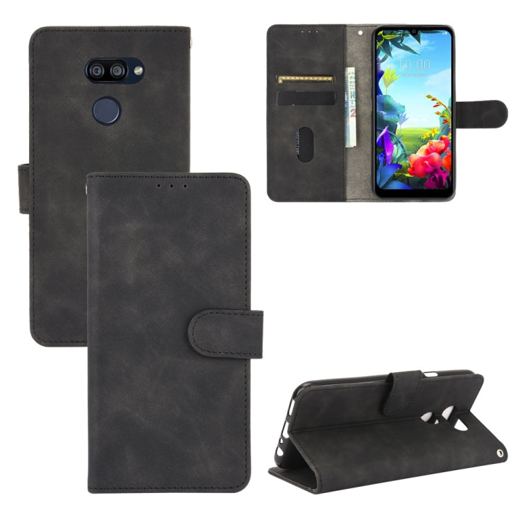 For LG K40S Solid Color Skin Feel Magnetic Buckle Horizontal Flip Calf Texture PU Leather Case with Holder & Card Slots & Wallet