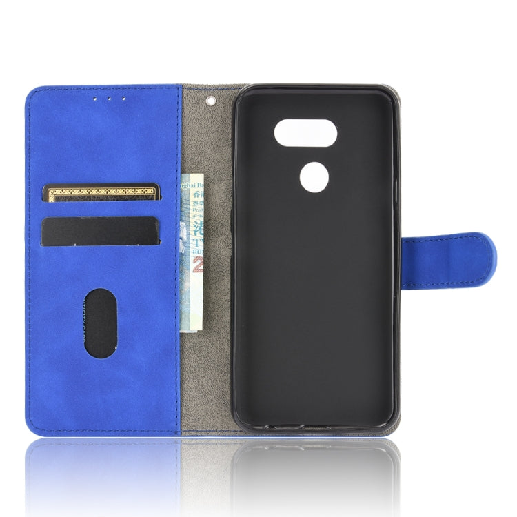 For LG K40S Solid Color Skin Feel Magnetic Buckle Horizontal Flip Calf Texture PU Leather Case with Holder & Card Slots & Wallet