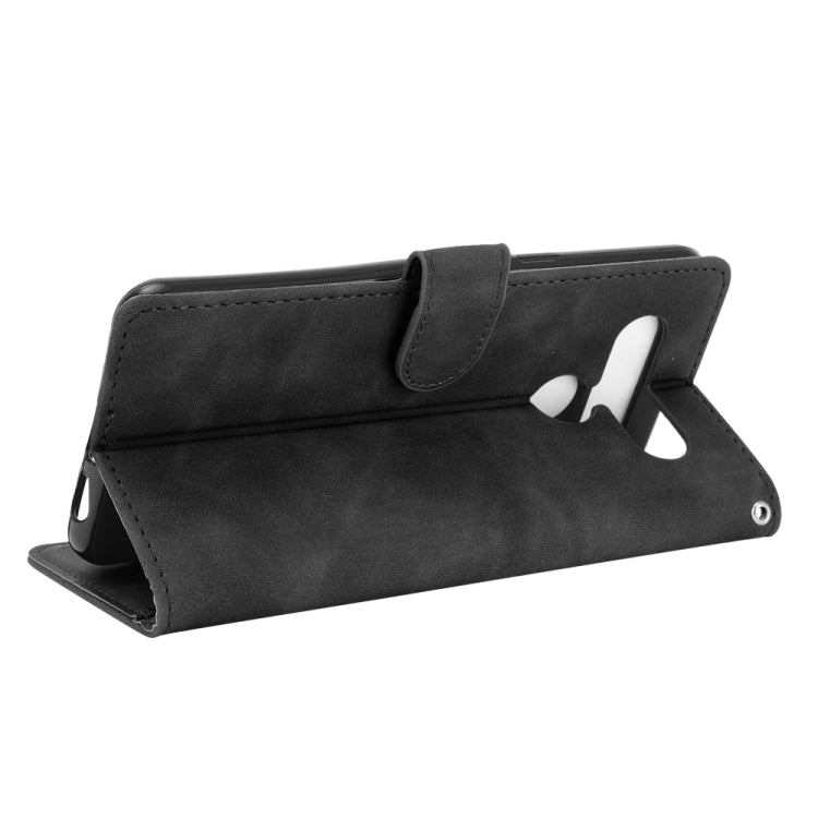 For LG K41S / K51S Solid Color Skin Feel Magnetic Buckle Horizontal Flip Calf Texture PU Leather Case with Holder & Card Slots & Wallet
