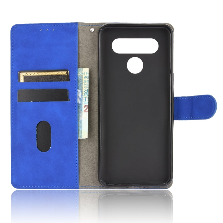 For LG K41S / K51S Solid Color Skin Feel Magnetic Buckle Horizontal Flip Calf Texture PU Leather Case with Holder & Card Slots & Wallet