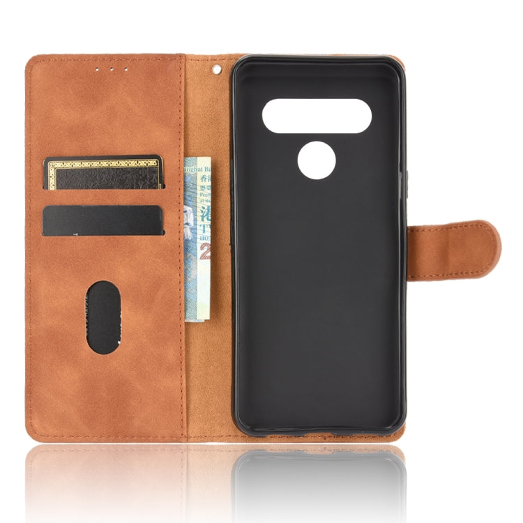 For LG K41S / K51S Solid Color Skin Feel Magnetic Buckle Horizontal Flip Calf Texture PU Leather Case with Holder & Card Slots & Wallet